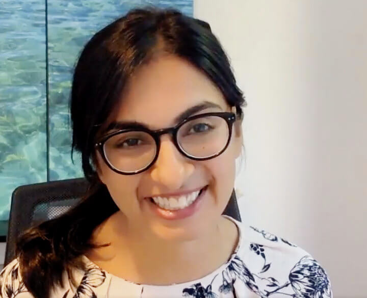 Woman wearing glasses smiling