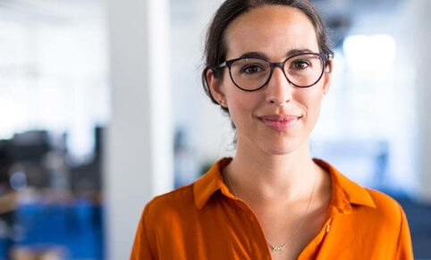 Female counsellor wearing glasses.