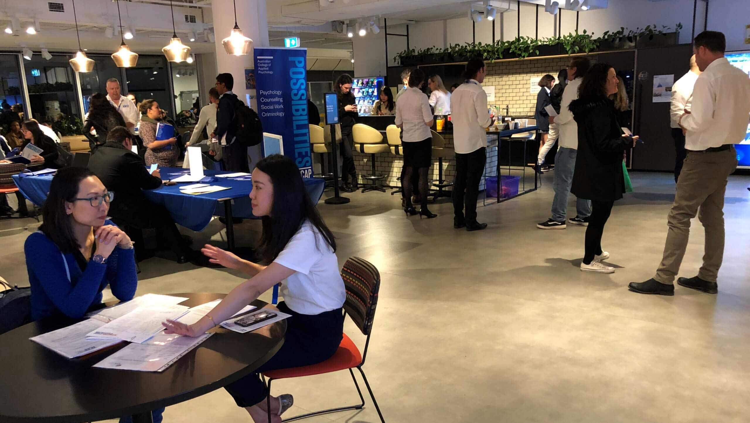 Group of people in open plan campus